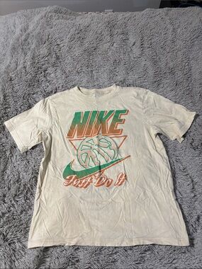 Nike Cream Tee with Green & Orange Graphic Accents